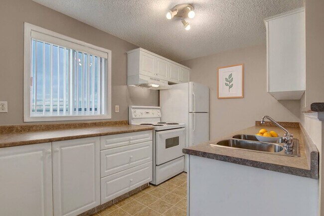 The Pointe at Applewood in Calgary, AB - Building Photo - Building Photo