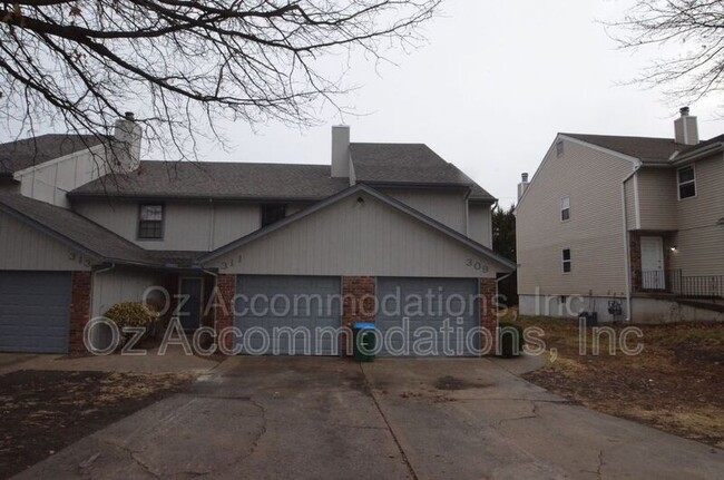 property at 311 NE Timbercreek Dr