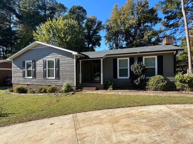 property at 909 SW Maynard Rd