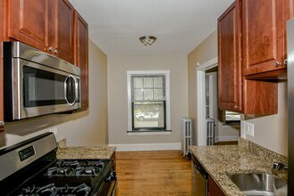 2119 W Ainslie St, Unit J03W in Chicago, IL - Building Photo - Building Photo