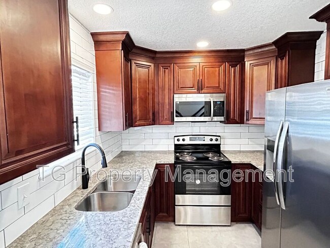 property at 111 E 1st St