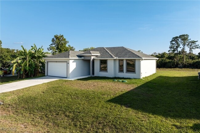 1134 Cummings St E in Lehigh Acres, FL - Building Photo - Building Photo