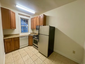 1111 Lamont St NW-Unit -104 in Washington, DC - Building Photo - Building Photo