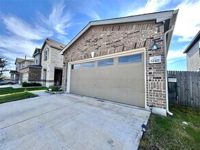 12421 Ace in the Hole Ln in Del Valle, TX - Building Photo - Building Photo