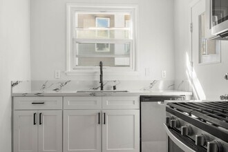 8813 Belford Ave in Los Angeles, CA - Building Photo - Building Photo