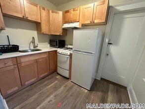 349 Pleasant St, Unit A1-3 in Malden, MA - Foto de edificio - Building Photo