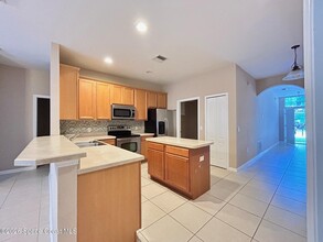 4116 Fitzroy Reef Dr in Mims, FL - Building Photo - Building Photo