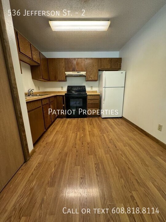 536 Jefferson St-Unit -2 in Mauston, WI - Building Photo