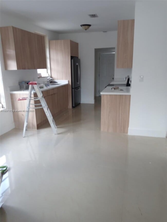 property at 249 E 3rd St