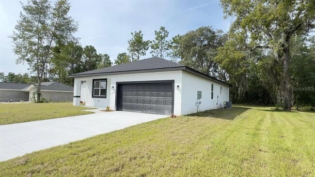 7914 N Omega Way in Citrus Springs, FL - Building Photo - Building Photo