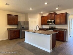 323 Moray Dr, Unit 108 in Palm Bay, FL - Building Photo - Building Photo