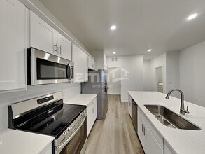 26153 E Calhoun Pl in Aurora, CO - Building Photo - Building Photo