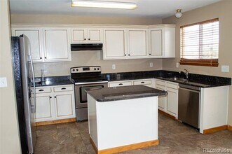 9340 W Indore Dr in Littleton, CO - Building Photo - Building Photo