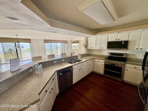 8934 Puerto Del Rio Dr in Cape Canaveral, FL - Building Photo - Building Photo