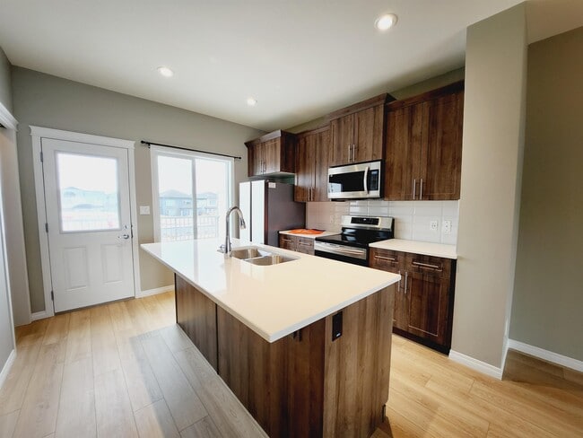 property at 1542-1157 157 St SW