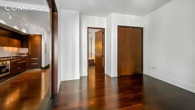 40 Broad St, Unit 16E in New York, NY - Building Photo - Building Photo