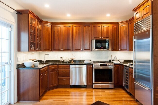 property at 402 E 3rd St