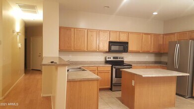 12522 W Campina Dr in Litchfield Park, AZ - Building Photo - Building Photo