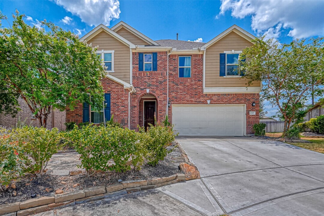 8707 Cimarron Falls Ct in Magnolia, TX - Building Photo