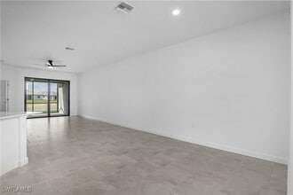 19557 Hinkley Dr in Estero, FL - Building Photo - Building Photo