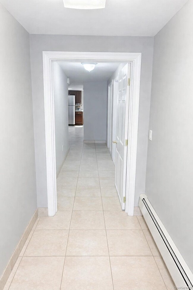 property at 56-25 136th St