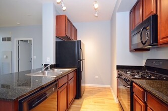 1255 S State St, Unit 1909 in Chicago, IL - Building Photo - Building Photo