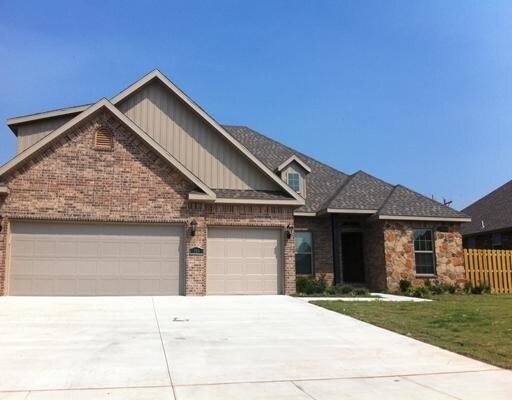 property at 703 SW Elmside Dr