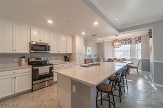 9590 Trevi Ct in Naples, FL - Building Photo - Building Photo