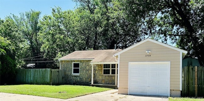 property at 3704 E 2nd St S