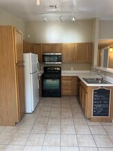 8438 Thunder Ridge Way, Unit 201 in Highlands Ranch, CO - Foto de edificio - Building Photo