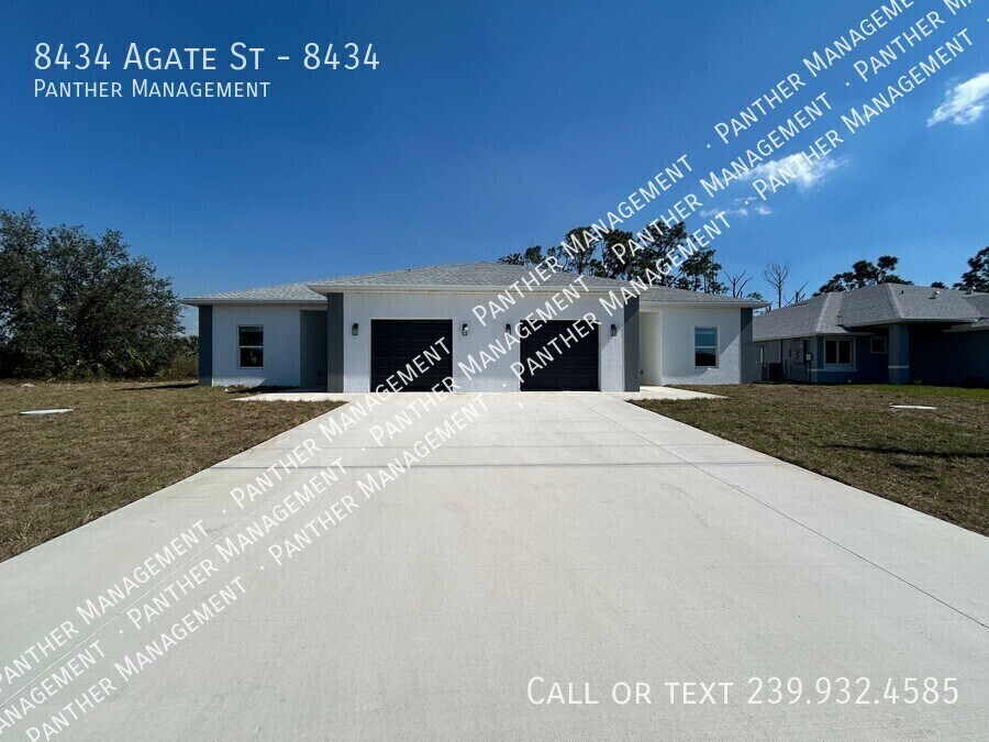 8434 Agate St-Unit -8434 in Port Charlotte, FL - Building Photo