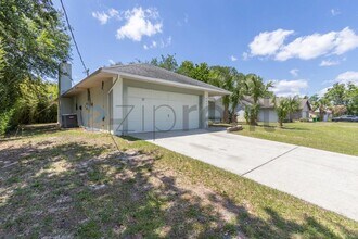 7458 Carillon Ave in Cocoa, FL - Building Photo - Building Photo
