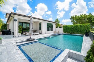8795 Grand Prix Ln in Boynton Beach, FL - Building Photo