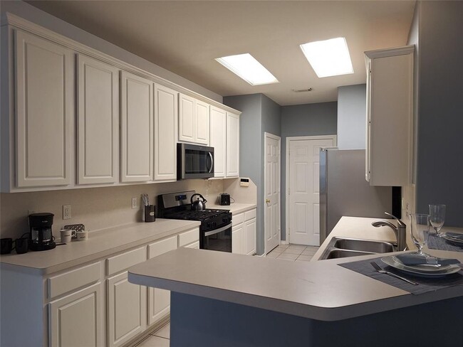6 Scenic Brook Ct in Spring, TX - Foto de edificio - Building Photo