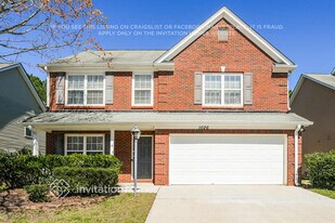 1026 Hawthorn Ln in Grayson, GA - Building Photo