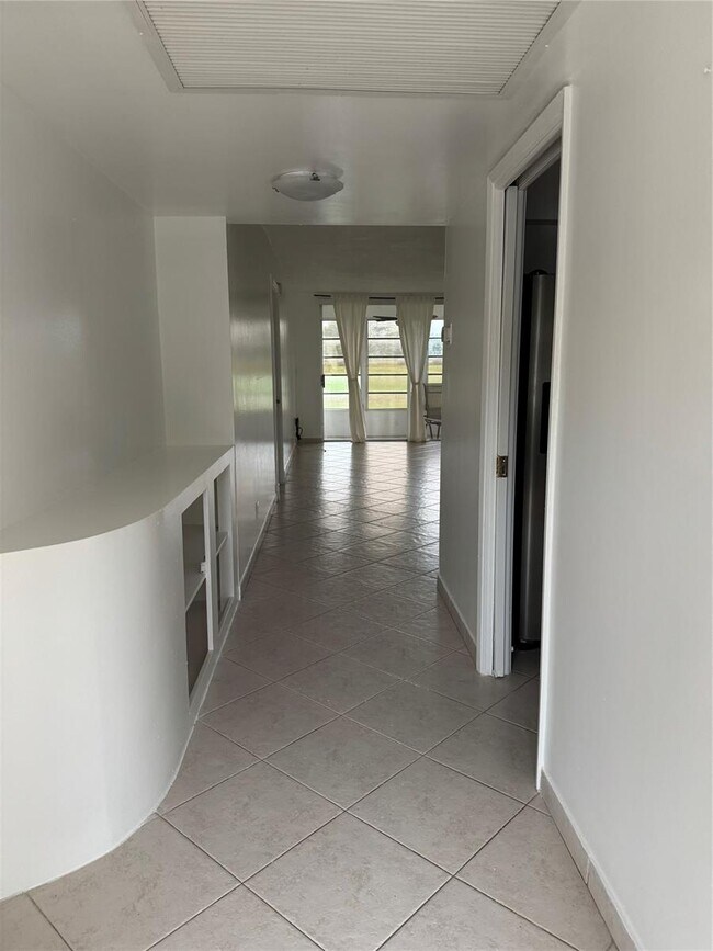 2651 S Course Dr, Unit 106 in Pompano Beach, FL - Building Photo - Building Photo