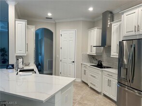 9569 Siracusa Ct in Naples, FL - Foto de edificio - Building Photo