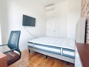 Central AC, washer/dryer, Exposed Brick Room #214, Unit 3 in Queens, NY - Building Photo - Building Photo