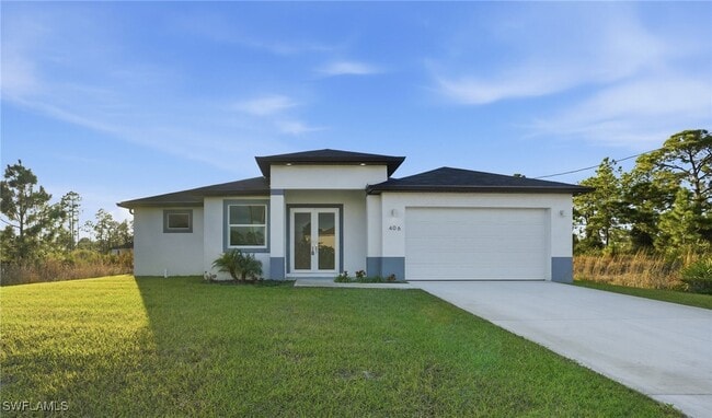 406 Genoa Ave S in Lehigh Acres, FL - Building Photo - Building Photo