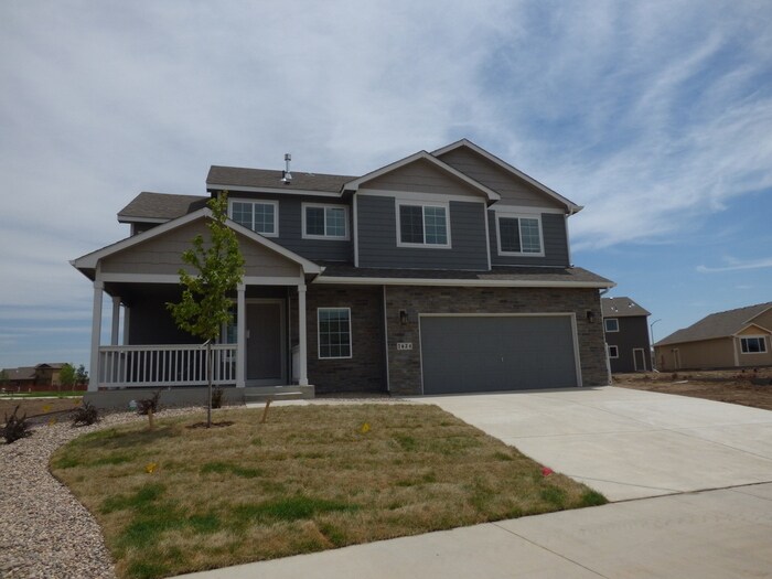 7624 Back Stretch Dr in Wellington, CO - Building Photo