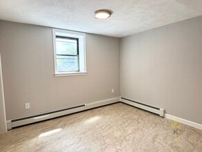 50 Harvard Ave, Unit #B1 in Brookline, MA - Foto de edificio - Building Photo