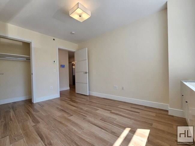 Modern 1-Bedroom with Balcony in Prime Nor in Queens, NY - Building Photo - Building Photo