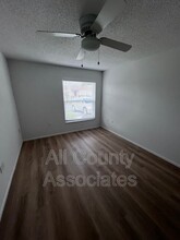 6141 Chesham Dr in New Port Richey, FL - Building Photo - Building Photo