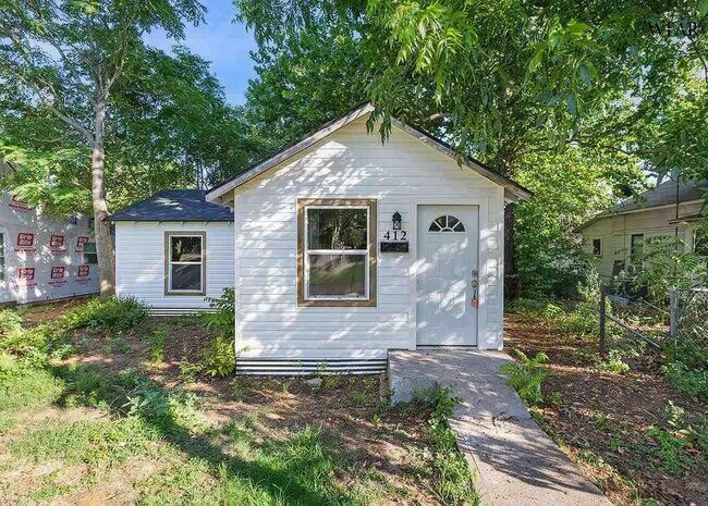 property at 412 E 1st St