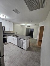 7302 NW 76th Dr in Tamarac, FL - Building Photo - Building Photo