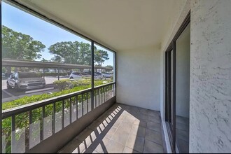 2595 Countryside Blvd, Unit 8-106 (55+ Condo) in Clearwater, FL - Building Photo - Building Photo
