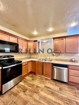6941 Village River Ln in Midvale, UT - Building Photo
