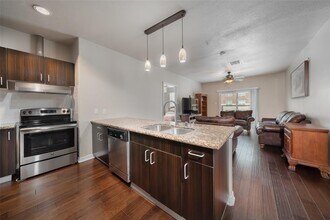 1100 W Trinity Mills Rd-Unit -2017 in Carrollton, TX - Building Photo - Building Photo