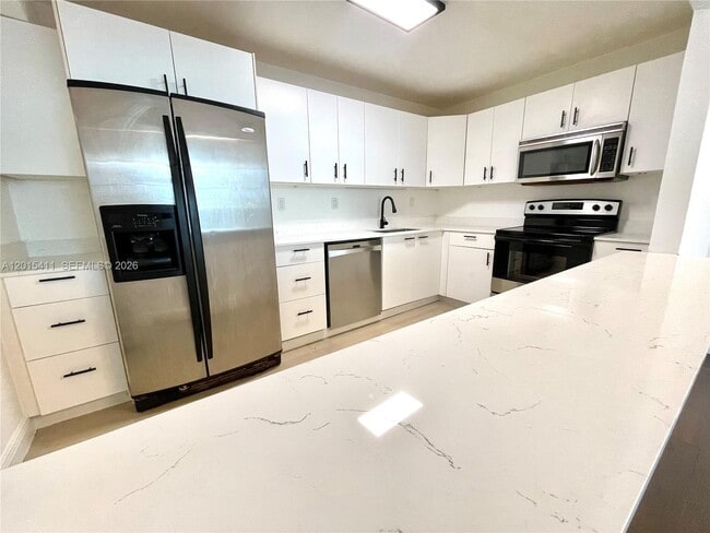property at 19390 Collins Ave