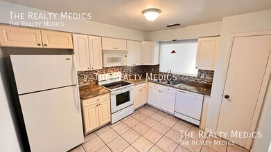 7628 University Garden Dr in Winter Park, FL - Building Photo - Building Photo